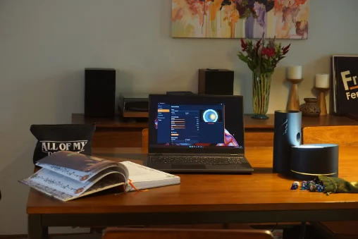 Game night at the table with a laptop